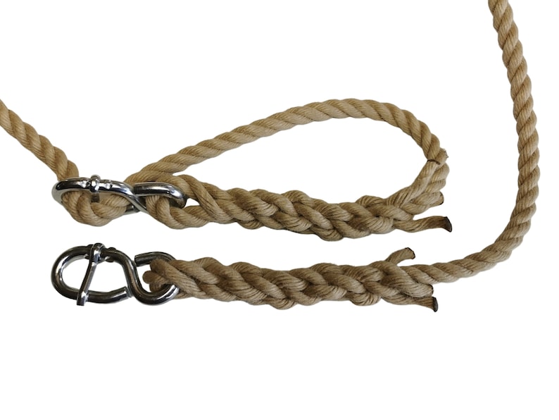May include: Two brown ropes with silver metal clasps. The ropes are braided and have a loop at one end.