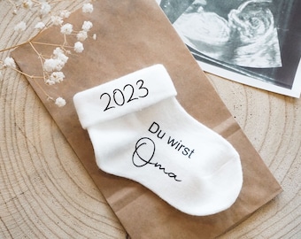 Announce your pregnancy with baby socks. Great gift for all future fathers, grandmas, grandpas or aunts and uncles