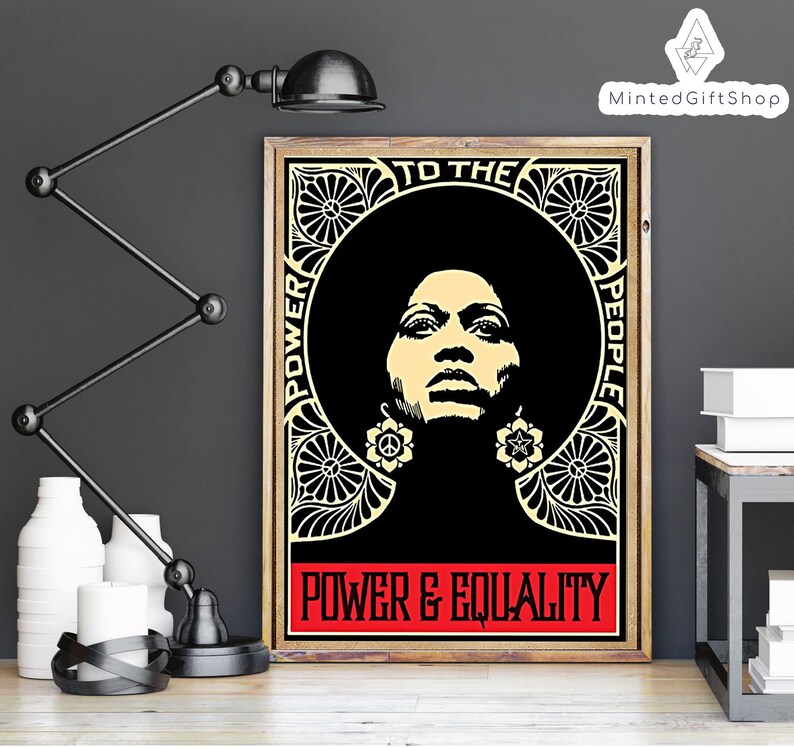 May include: A black and white poster featuring a woman with an afro wearing earrings. The poster has a yellow background with a black border and the text "To the People" and "Power & Equality".