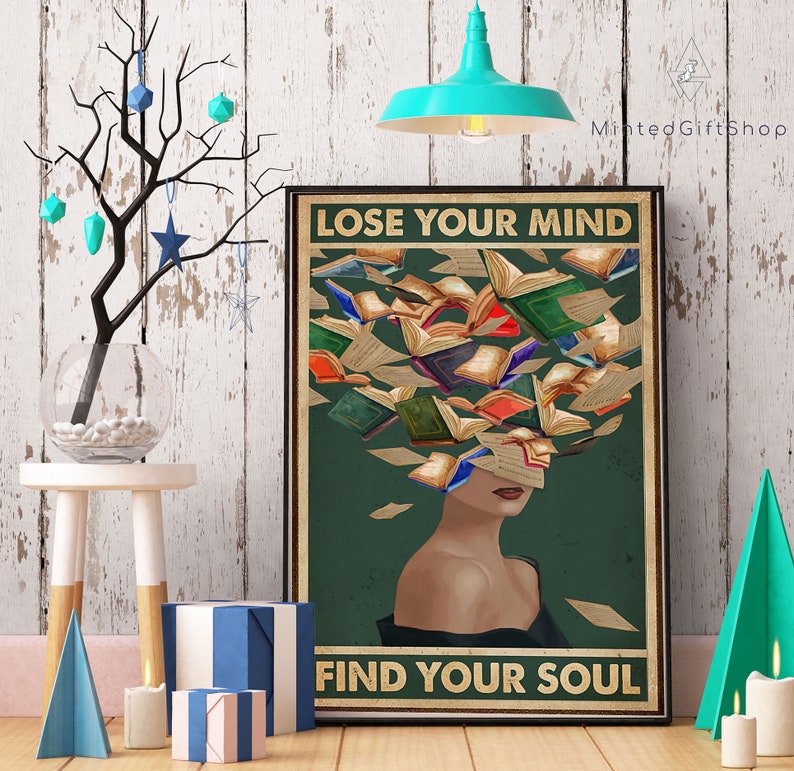 May include: A vintage-style poster with a woman's face surrounded by flying open books. The text on the poster reads "Lose Your Mind Find Your Soul".