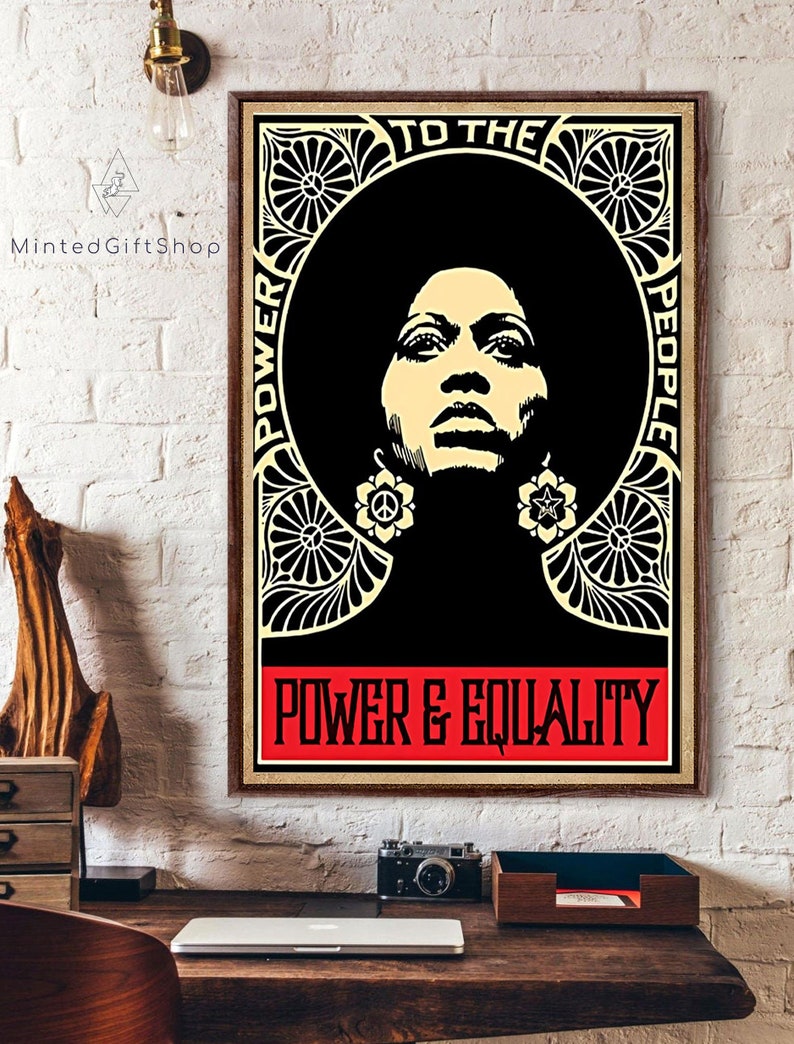 May include: A black and white poster featuring a stylised image of a woman with an afro. The poster has a gold border and the text "TO THE PEOPLE POWER & EQUALITY" in a red banner.