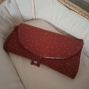 Cambiador nómada Marsala/oro