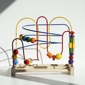 Montessori bead maze, handmade from solid sprucewood | TRE
