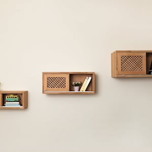 3 sized floating enclosed shelves for your wall.