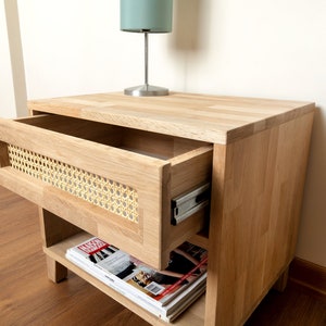 Slowly opens and safely locked drawer.