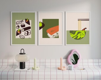 May include: Three framed prints with abstract designs. The left print features a black and white illustration of sushi rolls. The center print features a green and orange abstract design. The right print features a green and yellow abstract design with a white bowl.