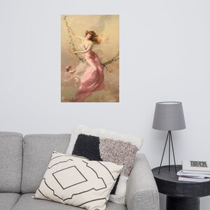 Peut inclure: Une peinture d'une femme en robe rose, avec des cheveux flottants, se balan&ccedil;ant sur une vigne. Deux ch&eacute;rubins volent derri&egrave;re elle.
