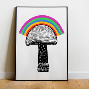May include: Black and white art print of a mushroom with a rainbow arching over it. The mushroom's cap has a lined pattern, and the stem features stars, constellations, and a wavy design. The print is framed in a black frame.