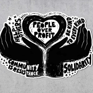May include: Black and white sticker with a heart-shaped design and the words "People Over Profit." The design includes two hands cupping the heart, with additional text: "Help Others," "Be Kind to Every Kind," "Community is Resistance," and "Solidarity."