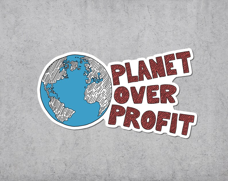 May include: A sticker featuring a blue and white illustrated globe with the text "PLANET OVER PROFIT" in red. The sticker is on a gray textured background.