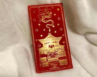May include: Red envelope with a gold design of a dragon and a building with a star pattern.