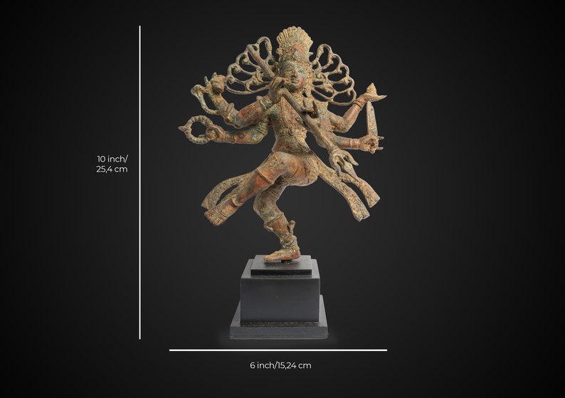 May include: A bronze sculpture of a Hindu deity with multiple arms, dancing on a black base. The sculpture is 10 inches tall and 6 inches wide.