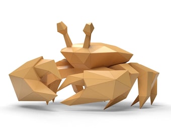 May include: A geometric origami crab sculpture made of paper. The crab is a light brown color and has a detailed, folded design.
