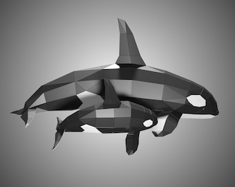 May include: A black and white origami-style orca whale with a smaller orca whale swimming underneath it.