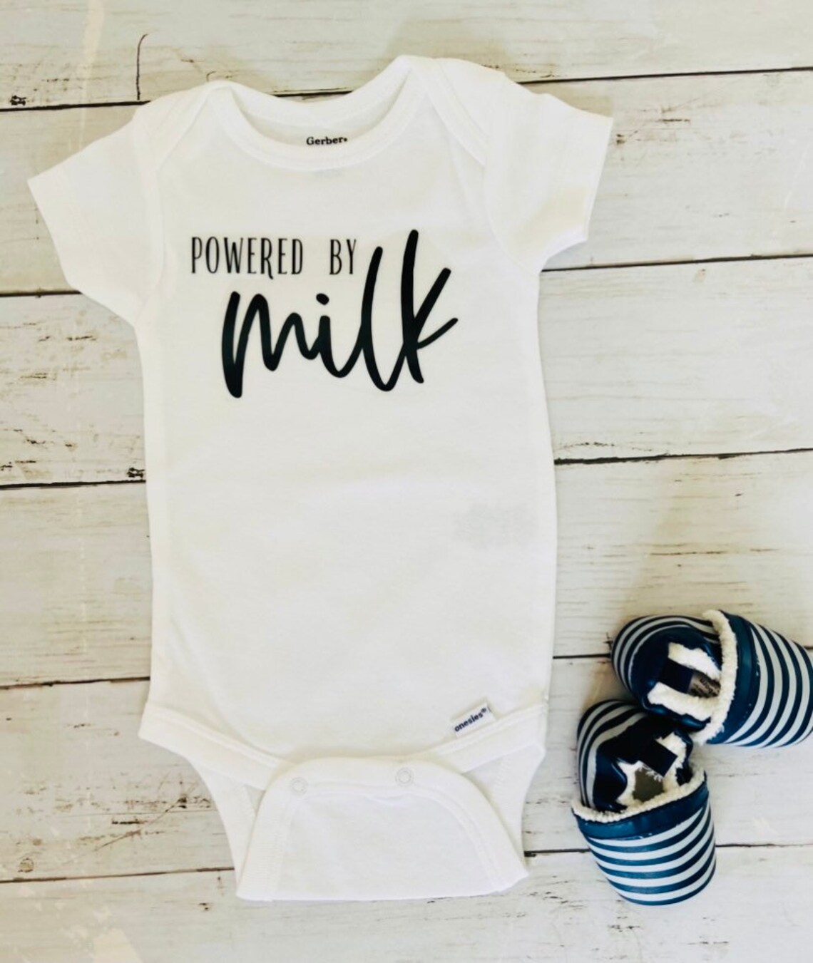 Powered by milk onesie cute saying baby onesie baby shower Etsy