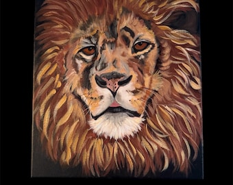 May include: A painting of a lion's head with a thick mane of brown and gold fur. The lion has a serious expression with dark eyes and a pink nose.
