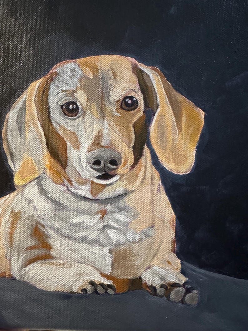 May include: A detailed painting of a dachshund dog with a light brown coat and floppy ears. The dog is depicted in a seated position, with a focused gaze and a dark background. The artwork captures the dog's features with realistic detail.