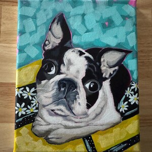 May include: A colorful painting of a Boston Terrier dog with a black and white coat. The dog is wearing a yellow collar with a black and white floral pattern. The background is a teal color with pink accents.