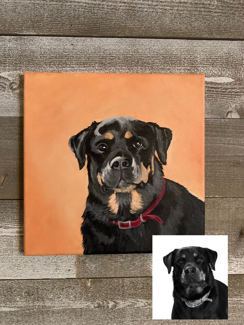 May include: A square canvas painting of a Rottweiler dog with a red collar. The dog has black fur with brown markings around the snout and eyes. The background is a solid peach color. A smaller black and white image of the dog is in the lower right corner.