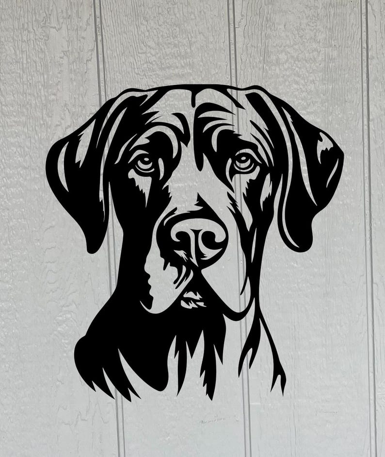 May include: Black and white silhouette of a dog's head. The dog has floppy ears and a serious expression.
