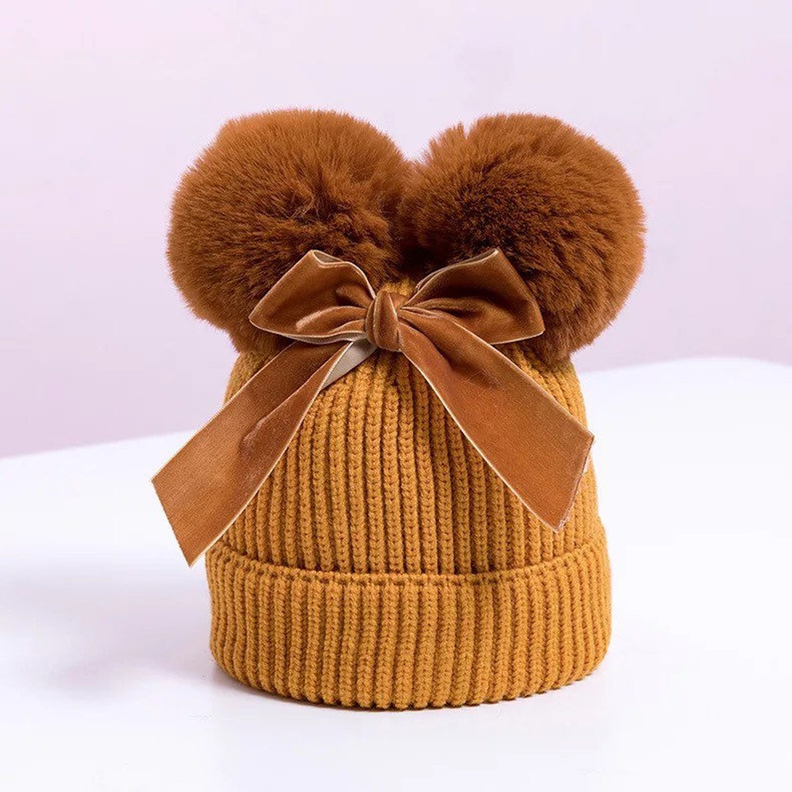 newborn knitted pom pom hat