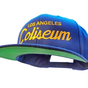 Los Angeles 90s Hat | The Coliseum Vintage-Style Embroidered Blue Snapback Cap with Yellow Script Lettering | 90’s Football SnapBack