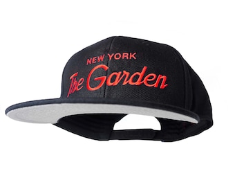 New York 90s Basketball Hat | The Garden Vintage Snapback Cap in Black with Orange Embroidered Script Lettering