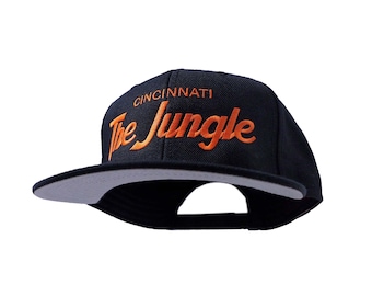 Cincinnati 90s Hat | The Jungle Embroidered Black Football Snapback Cap with Script Lettering