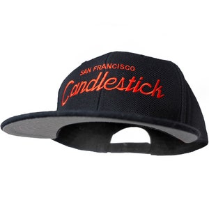 San Francisco 90s Baseball Hat | Candlestick Park Vintage Style Embroidered Black Snapback Cap with Orange Script Lettering