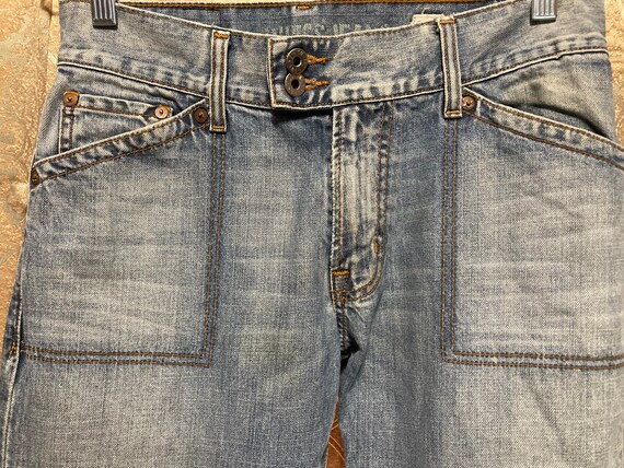 Guess stonewashed jeans deals