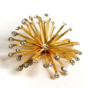 vintage gold tone and rhinestone starburst brooch / bendable rhinestone brooch / sunburst brooch / firework brooch / rhinestone sparkle pin