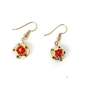 vintage red and white hand painted pierced gold flower sphere jingle dangle earrings / costume jewelry