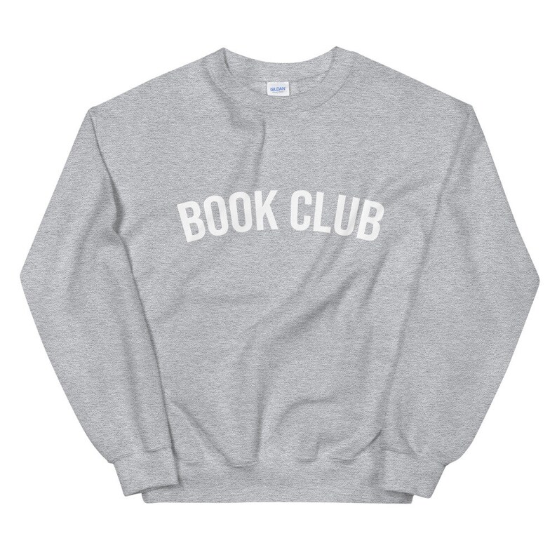 May include: A gray sweatshirt with the text "BOOK CLUB" printed in white on the front.