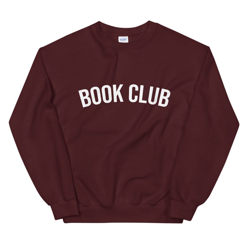 May include: Burgundy sweatshirt with white text that reads "BOOK CLUB".