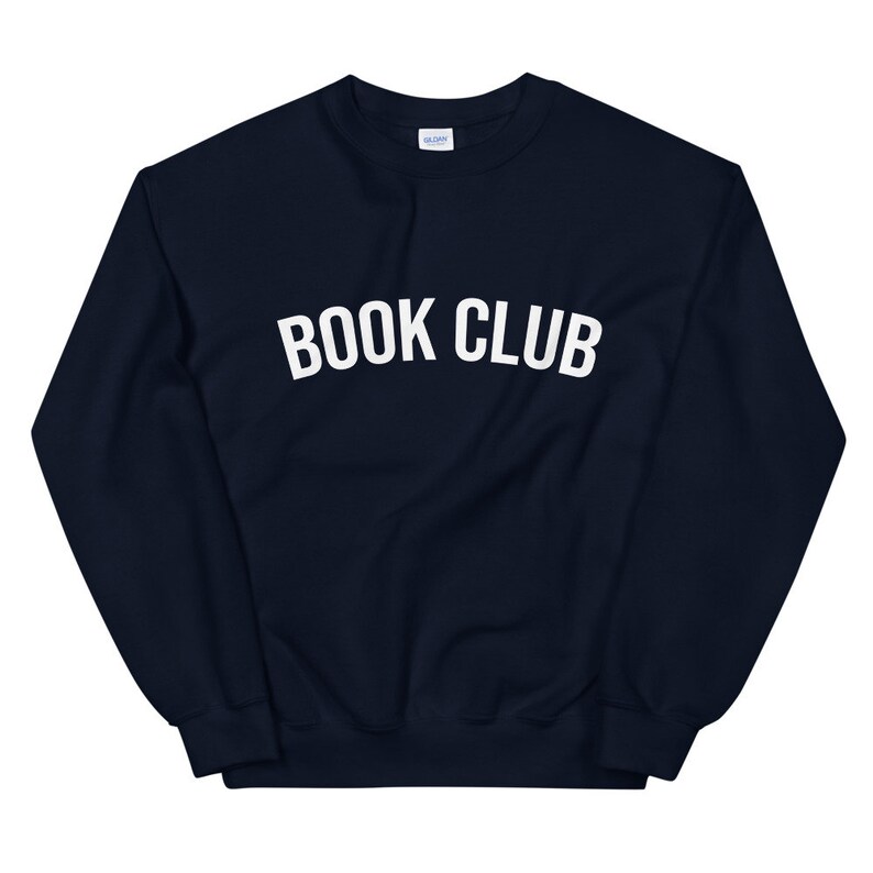 May include: Navy blue sweatshirt with white text that reads "BOOK CLUB".