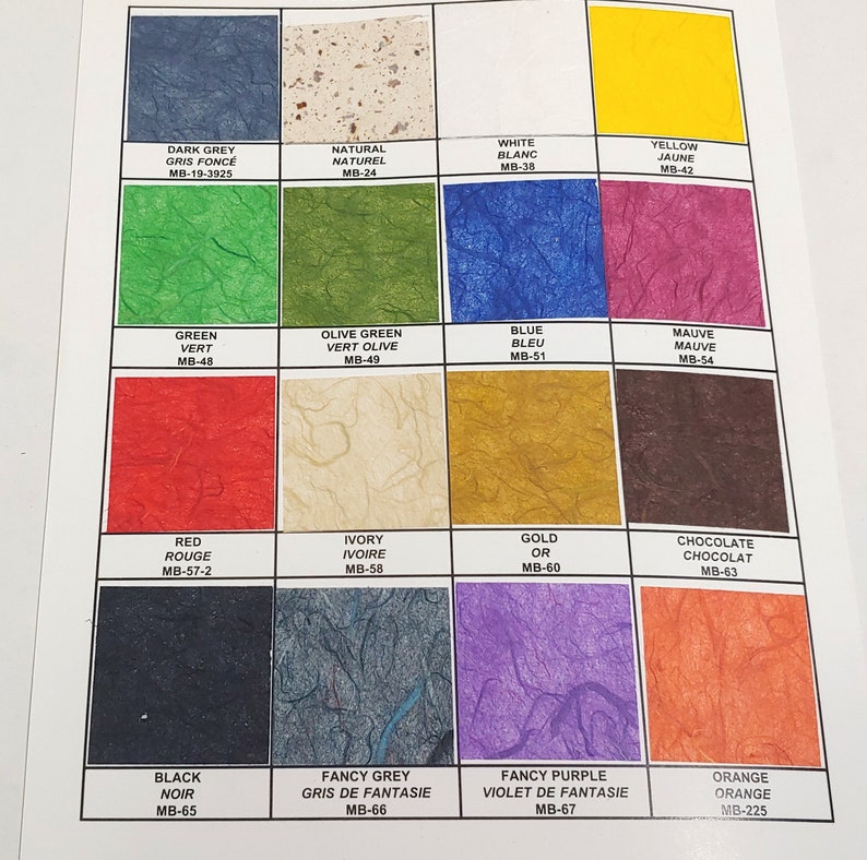 May include: A color chart with 16 different paint colors, each with a name and a corresponding color code. The colors include dark grey, natural, white, yellow, green, olive green, blue, mauve, red, ivory, gold, chocolate, black, fancy grey, fancy purple, and orange.