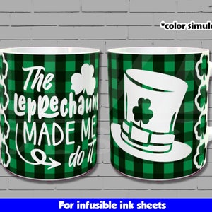 May include: Two white mugs with green and black checkered patterns. One mug features a leprechaun hat with a shamrock and the text "The Leprechaun Made Me Do It". The other mug features a leprechaun hat with a shamrock.