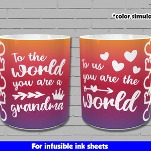 May include: Two white ceramic mugs with a gradient design of orange, red, and purple. The left mug says "To the world you are a grandma" with a crown and arrow. The right mug says "To us you are the world" with hearts and an arrow. Both mugs are for infusible ink sheets.