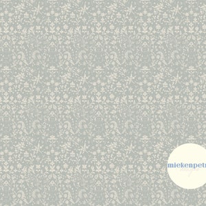 May include: A seamless pattern of white floral designs on a light blue background. The pattern is repeated throughout the image. The text "miekenpetra designs" is in a white circle in the lower right corner of the image.