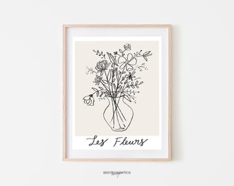 May include: A black and white line drawing of a bouquet of flowers in a vase. The flowers are arranged in a loose, natural style. The vase is simple and elegant. The text "Les Fleurs" is written below the vase.