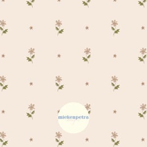 May include: A repeating pattern of small, light brown flowers with green stems and leaves on a pale pink background. The design includes larger and smaller flowers, creating a delicate, floral aesthetic. The text "mikenpetra designs" is in a white circle.