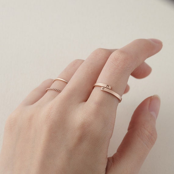 Two clearance letter rings