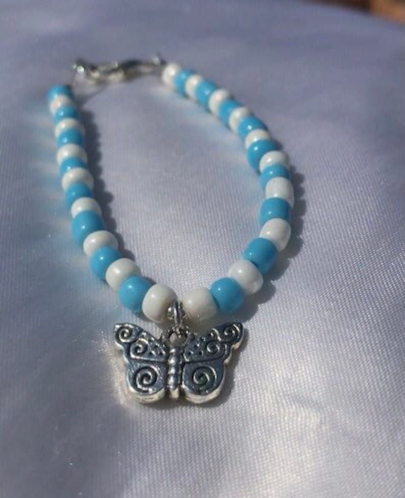 bead bracelet with butterfly charm