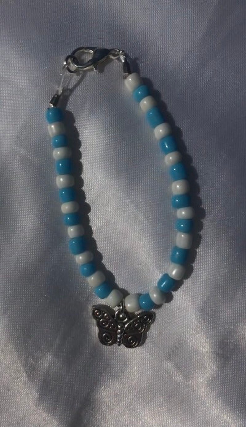 bead bracelet with butterfly charm