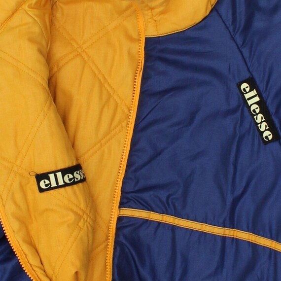 Doudoune ellesse jaune sale