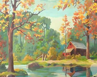 Peut inclure: Kit de peinture par numéros de style vintage représentant une scène de paysage avec une grange rouge, des arbres et une rivière. Le kit comprend une toile, des peintures et des pinceaux. Disponible en 3 tailles. Le texte "Peignez-le vous-même" est visible sur l'image.