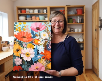 Könnte beinhalten: Eine Frau hält einen 50 x 65 Zoll großen Leinwanddruck mit einem farbenfrohen Blumenbild. Der Text "RELAX WITH OUR PAINT BY NUMBER DIY KITS create your personalized art gift for your family & friends" befindet sich am unteren Rand des Bildes.