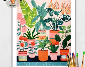 May include: A paint by number kit featuring a colorful illustration of potted plants with pink, green, and orange leaves. The text "AVAILABLE IN 3 CANVAS SIZES" is at the bottom of the image.