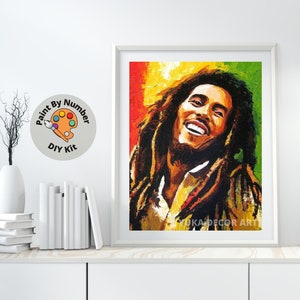 May include: Paint by numbers kit featuring a portrait of Bob Marley with a colorful background. The kit includes paints, brushes, and a canvas.