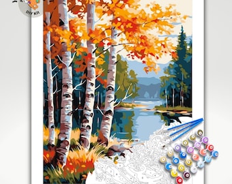 Könnte beinhalten: DIY-Malen-nach-Zahlen-Set mit einer Landschaftsszene mit einem See, Bäumen und Bergen. Die Bäume sind in Herbstfarben wie Orange, Gelb und Rot gehalten. Das Set enthält nummerierte Farben und Pinsel.
